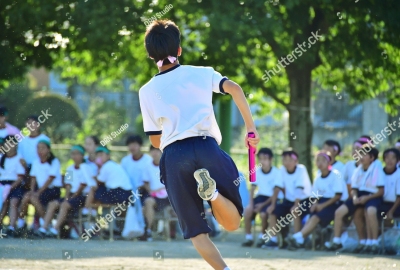 stock-photo-students-running-in-a-field-sports-day-in-japan-725151595